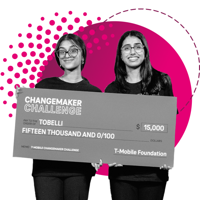 Two girls with a check
